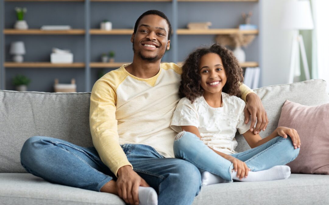 Happy african american family kid and dad spending time together Happy african american family kid and dad spending time together